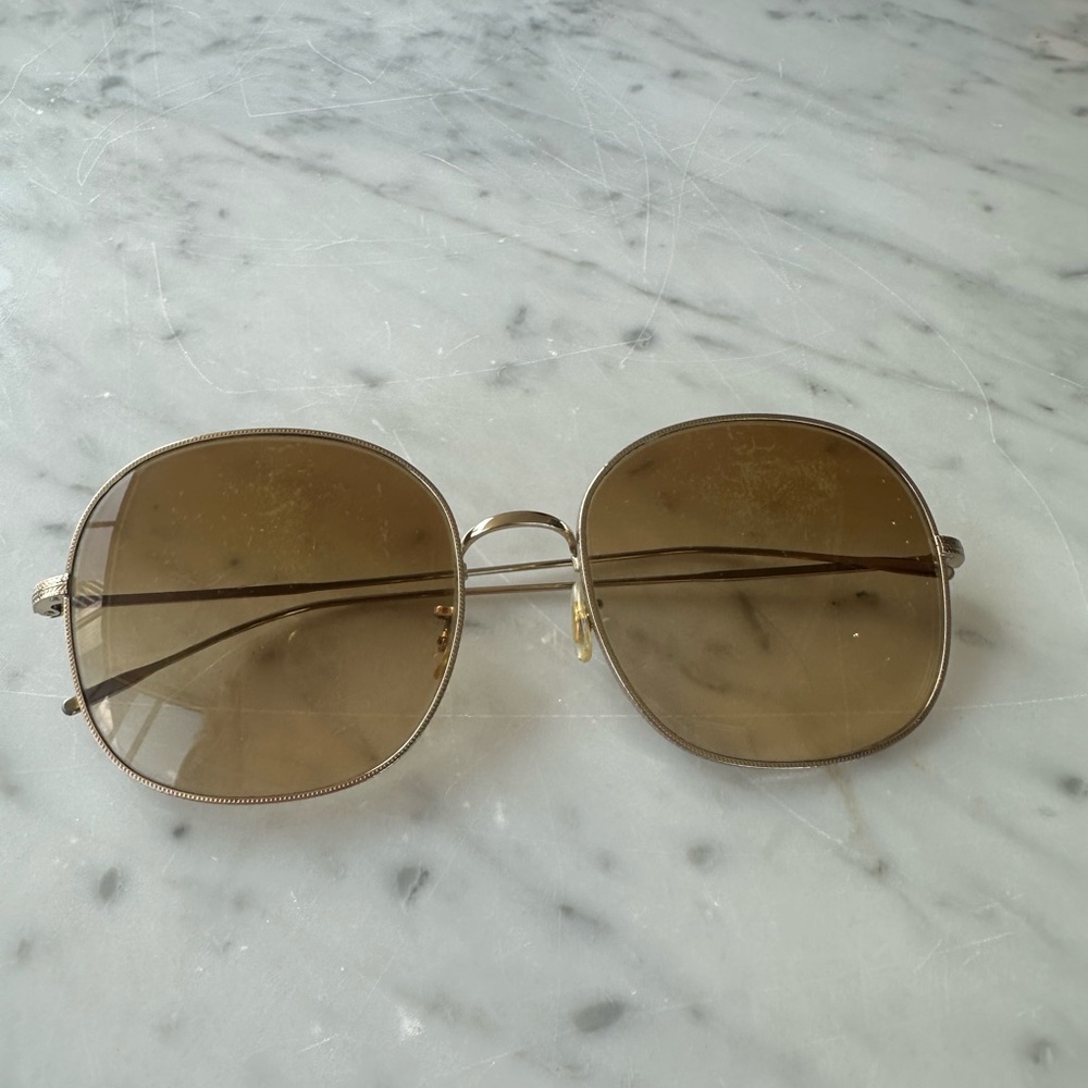 Oliver Peoples around Sunglasses